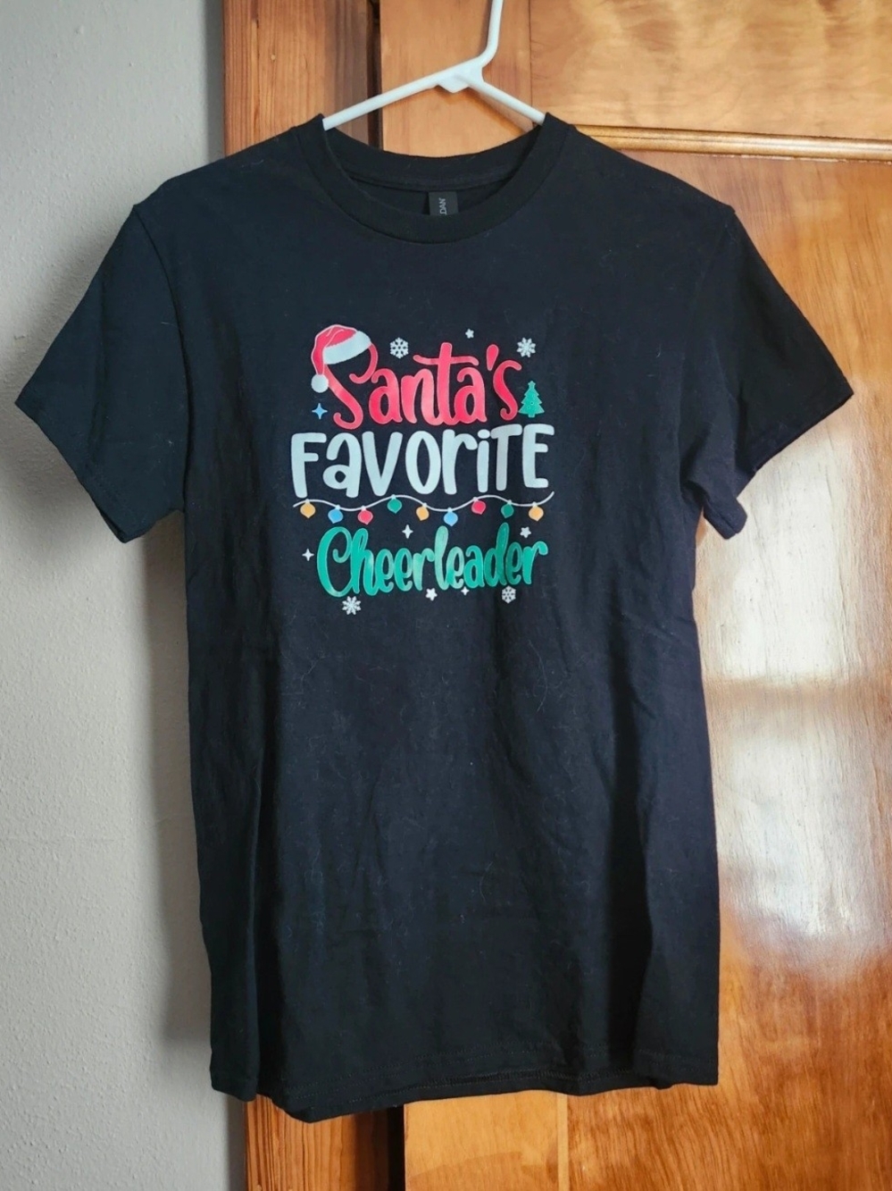 Santa's Favorite Cheerleader Black Holiday Tee